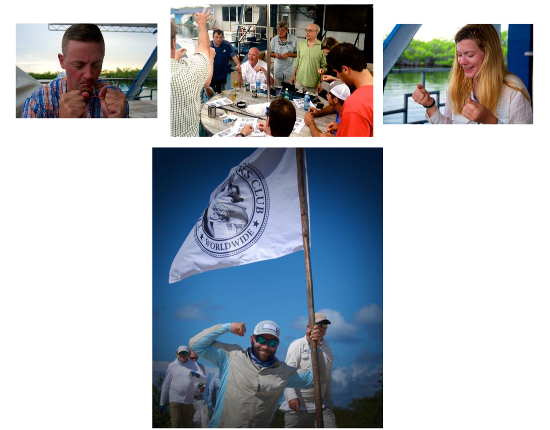 A group of people standing around a flag.